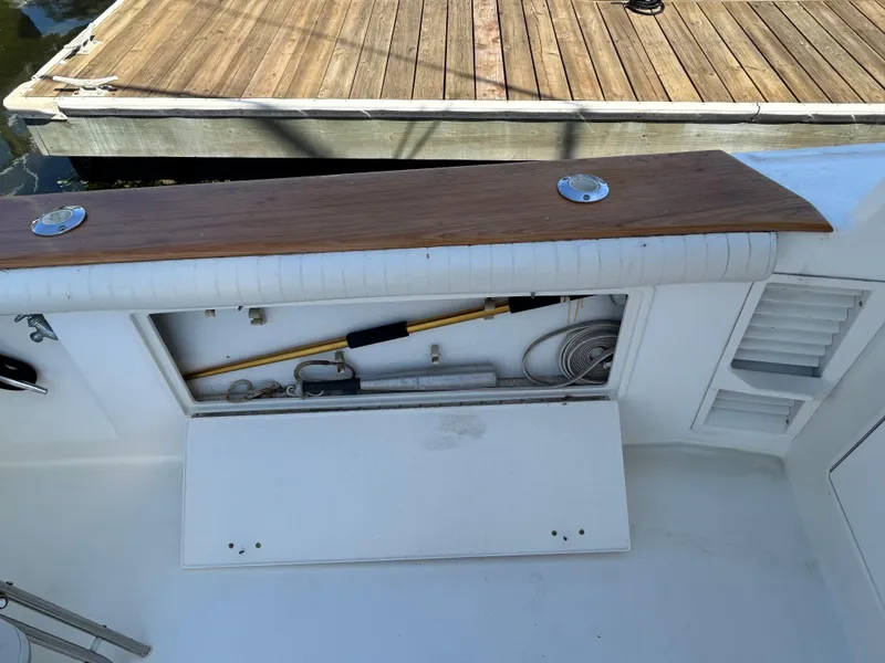 Slide: The Image of 1995 Ocean Yachts 42 Super Sport boat deck with storage compartment open. - 17