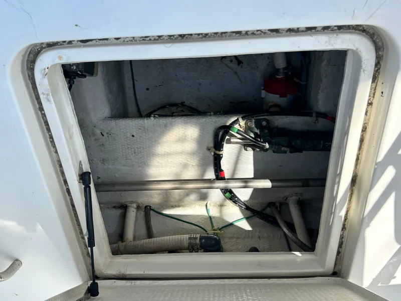 Slide: The Image of Open hatch of 1995 Ocean Yachts 42 Super Sport, showing interior compartment. - 22