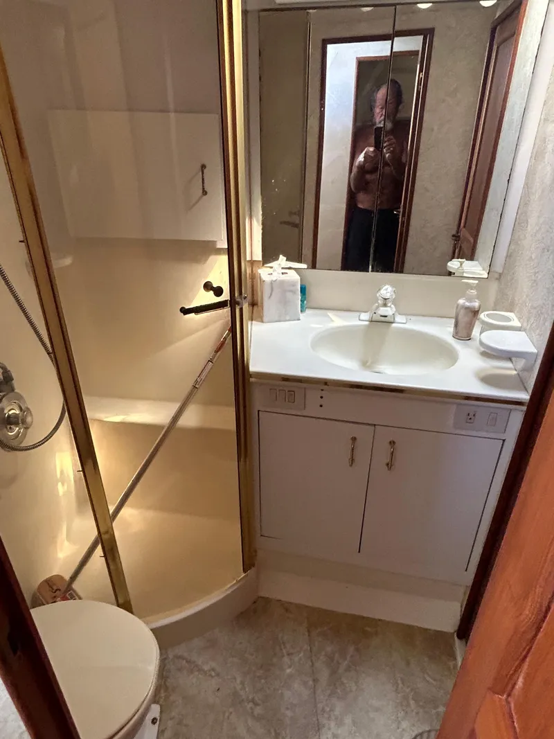 Slide: The Image of Bathroom interior of 1995 Ocean Yachts 42 Super Sport with shower and vanity. - 40