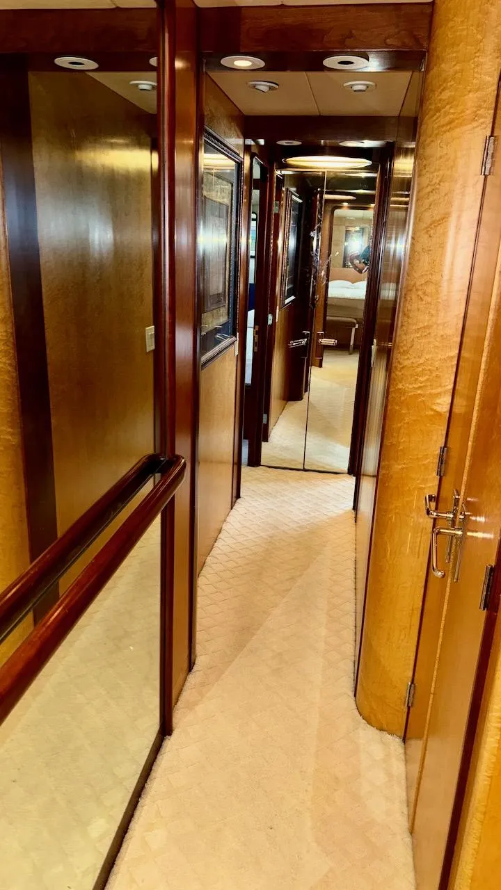 Slide: The Image of Luxurious wooden hallway interior of 1987 Burger 86 Raised Pilothouse yacht. - 18