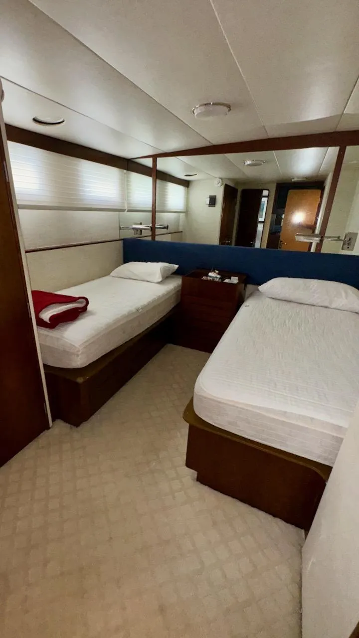 Slide: The Image of Twin bed cabin in 1987 Burger 86 Raised Pilothouse yacht, featuring modern decor and cozy ambiance. - 20