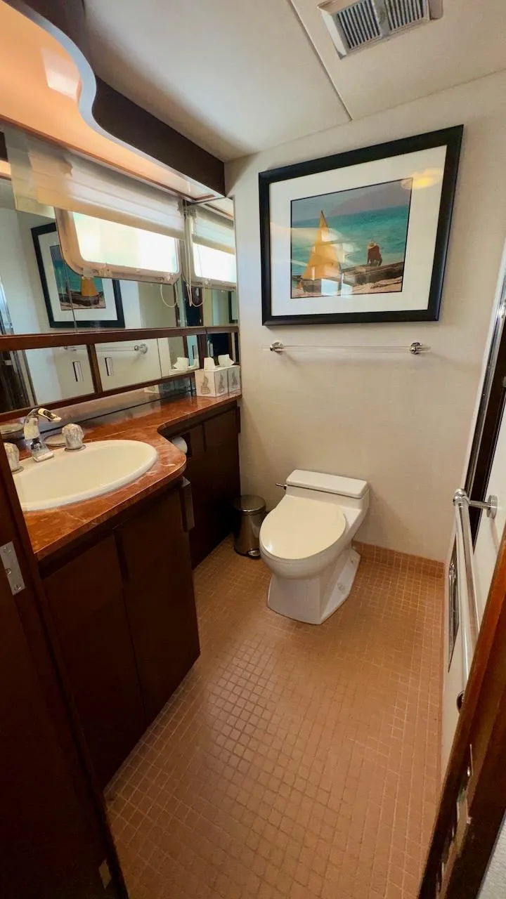 Slide: The Image of Luxurious bathroom in 1987 Burger 86 Raised Pilothouse yacht with elegant decor and modern amenities. - 27
