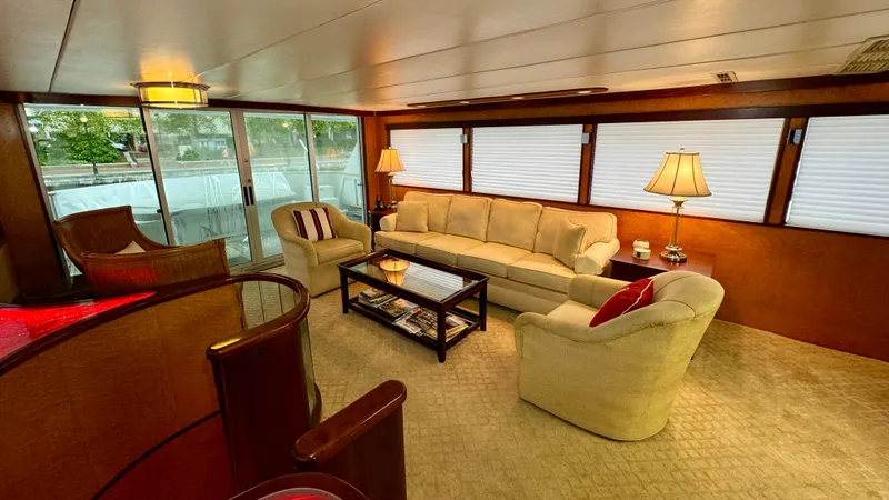 Slide: The Image of Luxurious interior of 1987 Burger 86 Raised Pilothouse yacht with elegant seating and decor. - 29