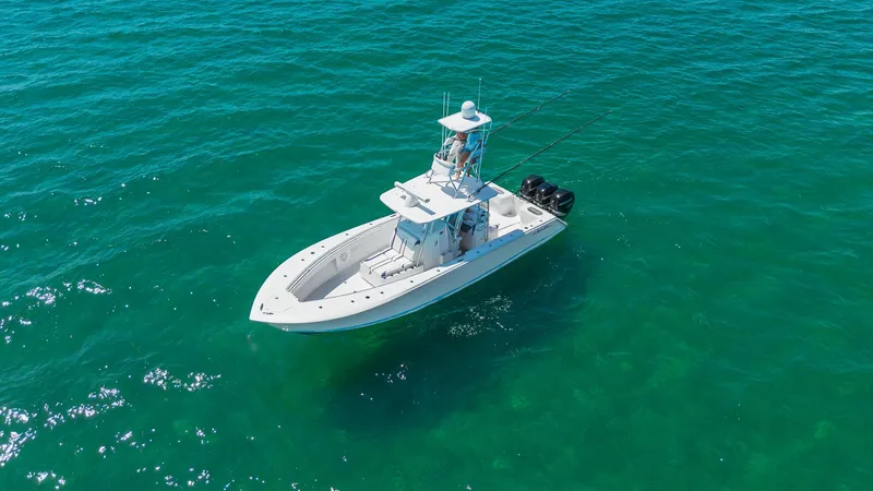 Slide: The Image of 2017 SeaHunter 35 Tournament boat on clear blue water, aerial view. - 3