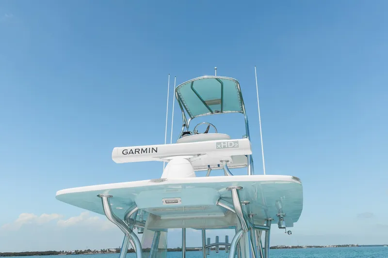 Slide: The Image of 2017 SeaHunter 35 Tournament boat with Garmin radar, clear blue sky background. - 9