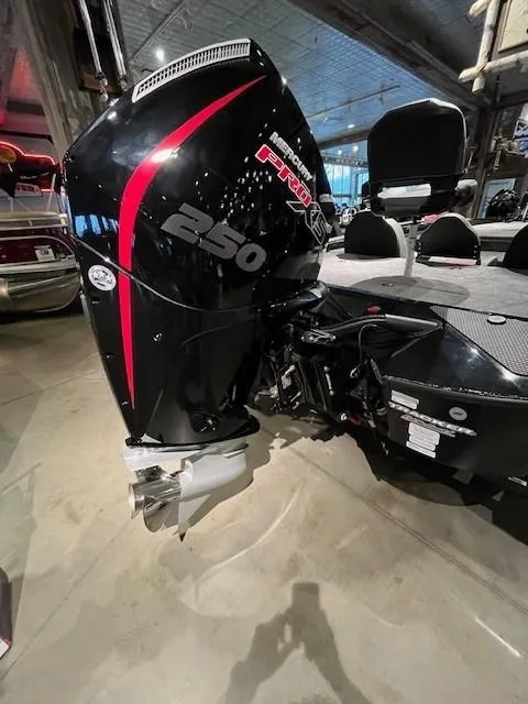 Slide: The Image of Steering wheel of 2025 Tracker Savage 215 boat with Garmin navigation system. - 5