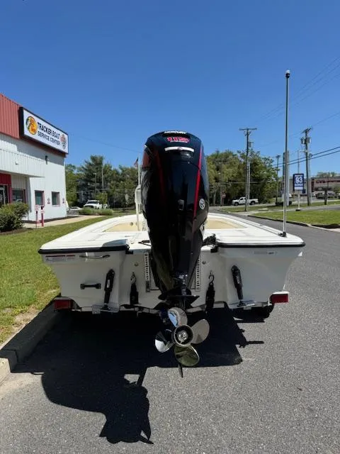 Slide: The Image of 2025 Mako 18 LTS boat with outboard motor on a sunny street. - 6