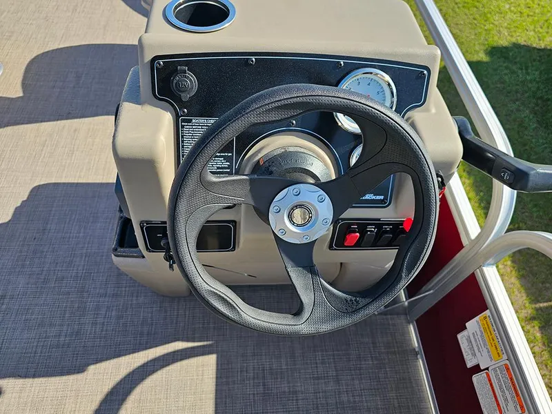 Slide: The Image of Steering console of 2025 Sun Tracker Bass Buggy 18 DLX pontoon boat. - 15
