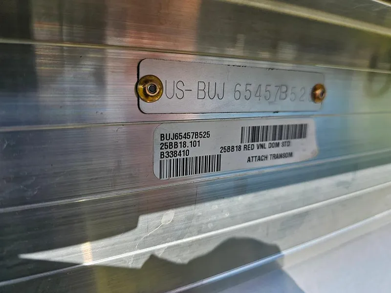 Slide: The Image of 2025 Sun Tracker Bass Buggy 18 DLX identification plate with serial and model numbers. - 21