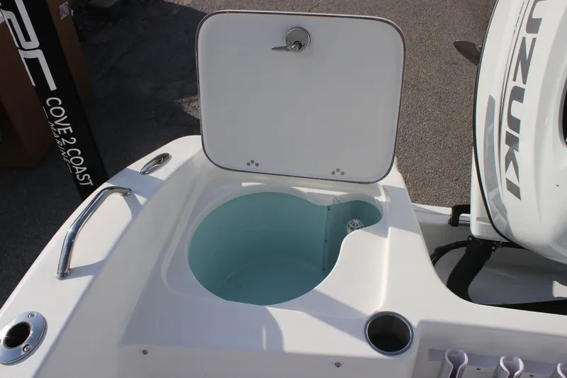 Slide: The Image of 2025 Sea Pro 202 CC boat with open livewell and Suzuki engine. - 10