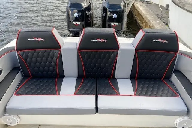 Slide: The Image of 1996 Powerplay Powerboats 33 Sportfish with stylish seating and dual Mercury 300 engines. - 16