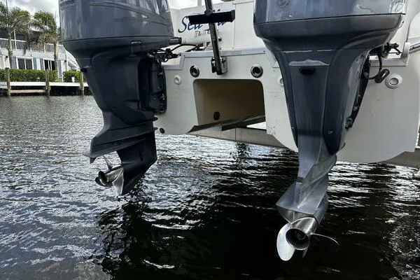Slide: The Image of Twin outboard motors on a 2004 World Cat 270 TE Tournament Edition boat. - 11