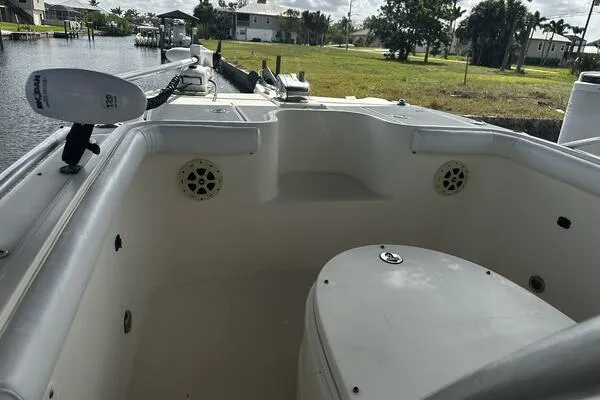 Slide: The Image of 2004 World Cat 270 TE Tournament Edition boat interior with seating and speakers. - 2