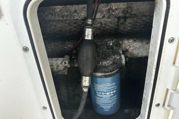 Slide: The Image of Fuel filter system in a 2004 World Cat 270 TE Tournament Edition boat. - 44