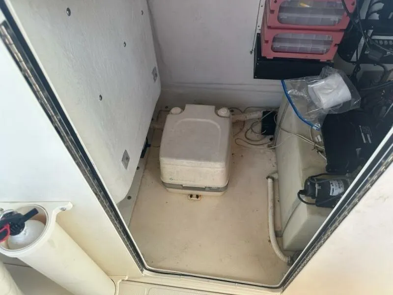 Slide: The Image of 2004 World Cat 270 TE interior storage area with equipment and supplies. - 8