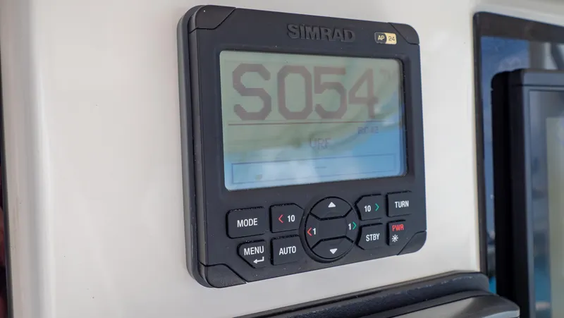 Slide: The Image of Simrad marine display on 2008 Intrepid 370 Cuddy boat dashboard. - 17