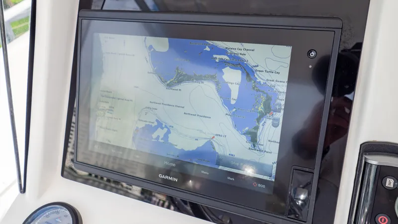 Slide: The Image of Garmin navigation display on 2008 Intrepid 370 Cuddy boat, showing detailed marine map. - 18