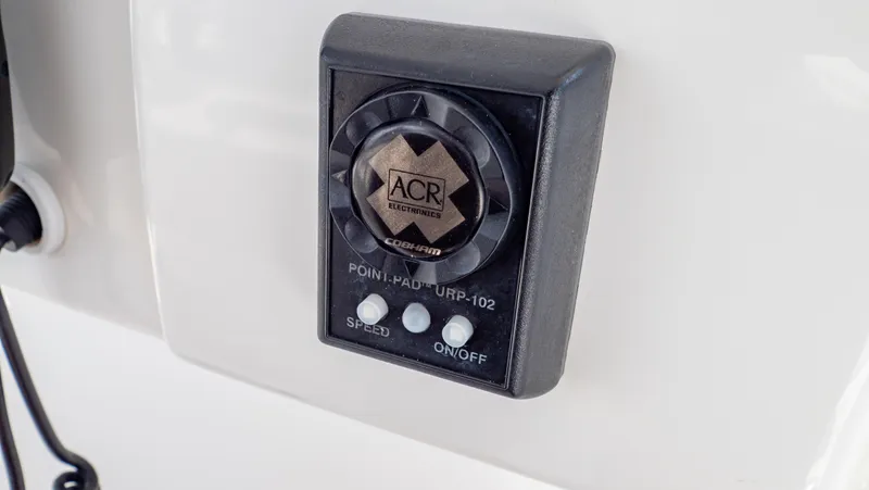 Slide: The Image of ACR control panel on 2008 Intrepid 370 Cuddy boat dashboard. - 24