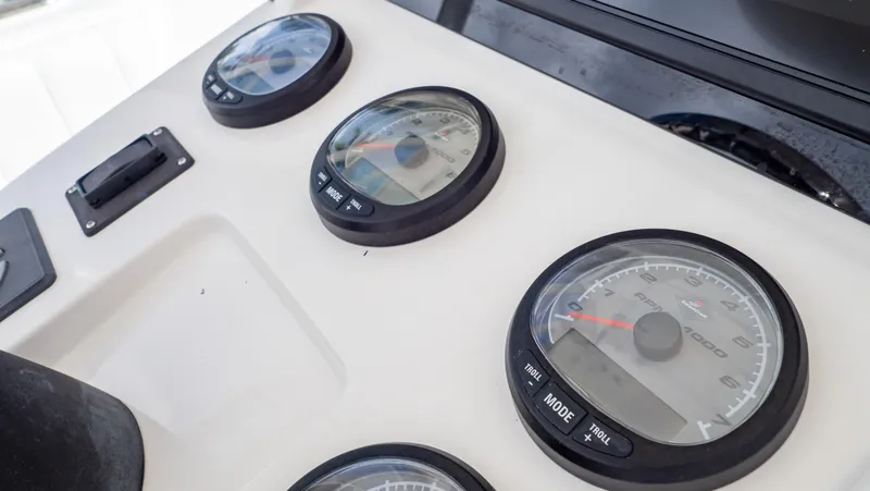 Slide: The Image of Dashboard gauges of a 2008 Intrepid 370 Cuddy boat. - 26