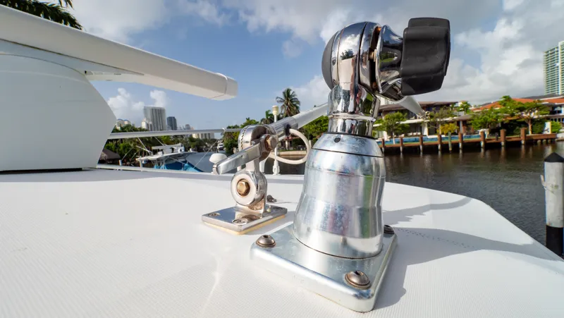 Slide: The Image of Close-up of a 2008 Intrepid 370 Cuddy boat deck with chrome fittings. - 33