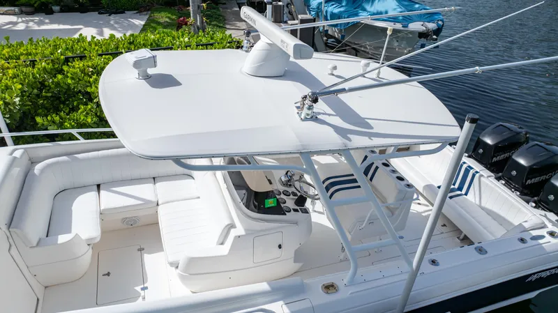 Slide: The Image of 2008 Intrepid 370 Cuddy boat with spacious seating and sleek design. - 41