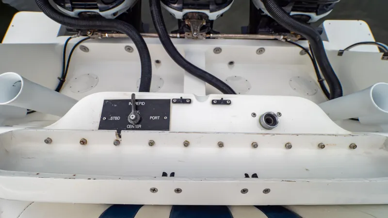 Slide: The Image of Close-up of a 2008 Intrepid 370 Cuddy boat's engine controls and wiring. - 46