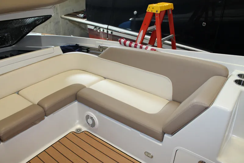 Slide: The Image of Luxurious seating on a 2007 Chris-Craft Launch 28 boat with teak flooring. - 16