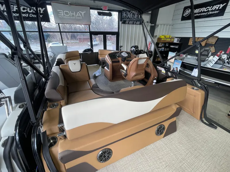Slide: The Image of 2025 Tahoe Pontoon 2185 LTZ interior with luxurious seating and modern design. - 7