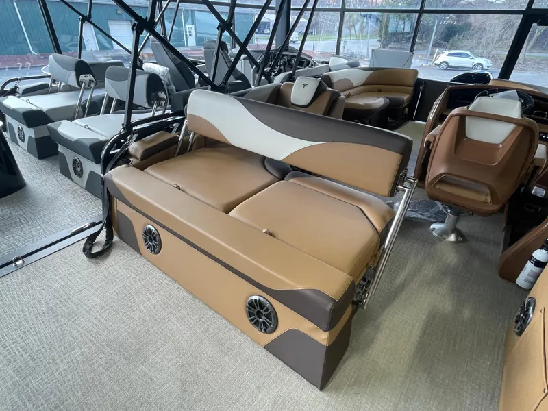 Slide: The Image of 2025 Tahoe Pontoon 2185 LTZ interior with luxurious seating and modern design. - 9