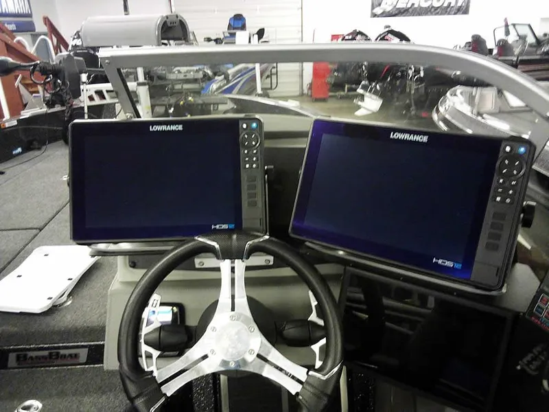 Slide: The Image of 2024 Ranger 622FS Pro DC boat dashboard with dual Lowrance HDS displays. - 28