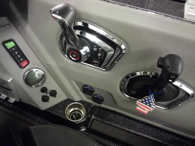 Slide: The Image of 2024 Ranger 622FS Pro DC boat controls with American flag keychain. - 32