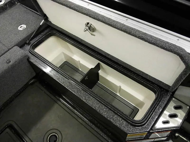 Slide: The Image of 2024 Ranger 622FS Pro DC boat storage compartment with secure latch and sleek design. - 34