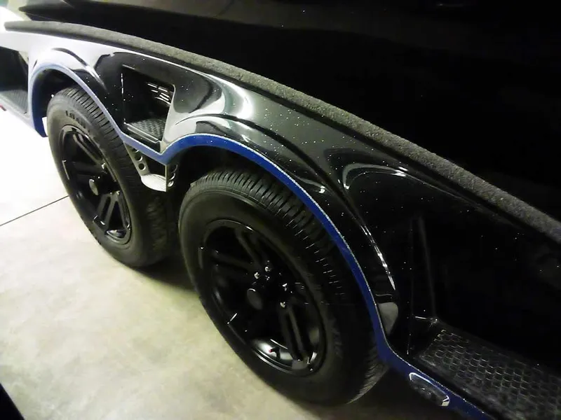 Slide: The Image of 2024 Ranger 622FS Pro DC trailer with black wheels and blue accents. - 4