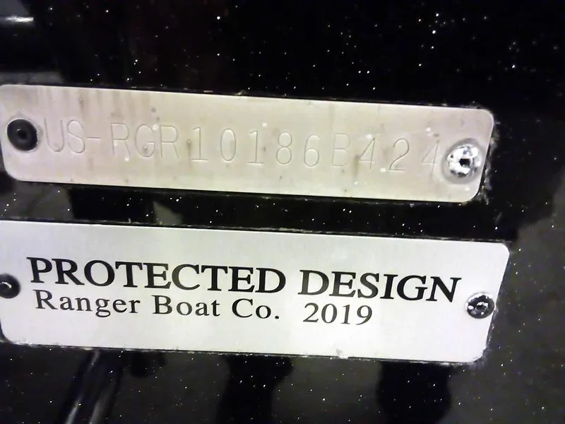 Slide: The Image of 2024 Ranger 622FS Pro DC boat with protected design plaque, serial number visible. - 42