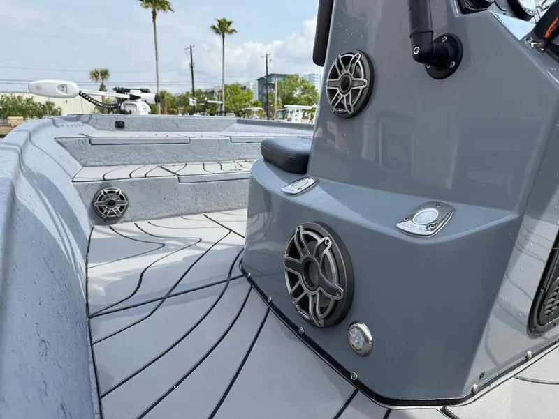 Slide: The Image of 2024 Blazer 2400 boat interior with sleek design and modern audio system. - 12