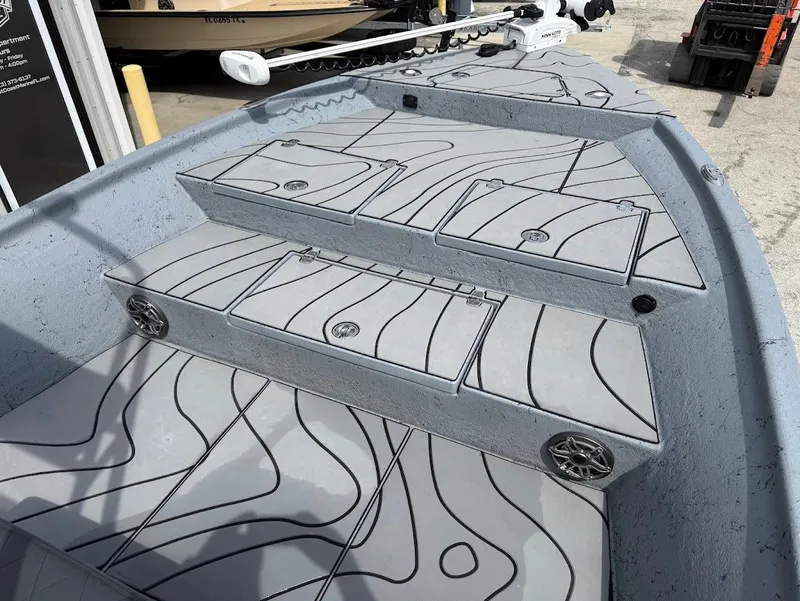 Slide: The Image of 2024 Blazer 2400 boat interior with sleek, modern design and storage compartments. - 15