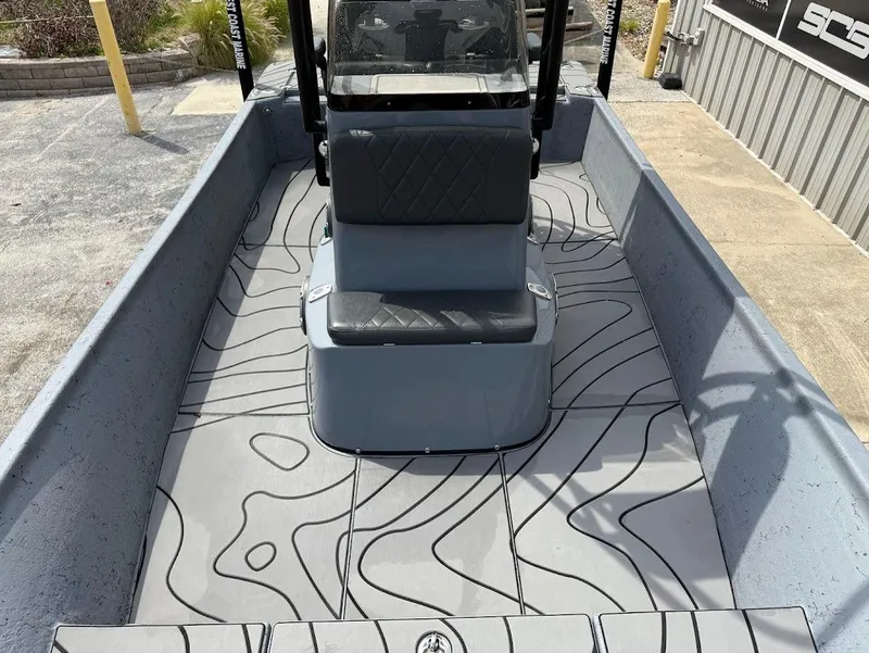 Slide: The Image of 2024 Blazer 2400 boat interior with modern seating and stylish floor design. - 16