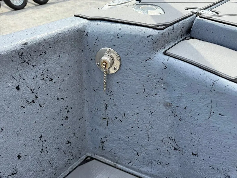 Slide: The Image of 2024 Blazer 2400 boat interior with textured gray finish and metal fixture detail. - 20