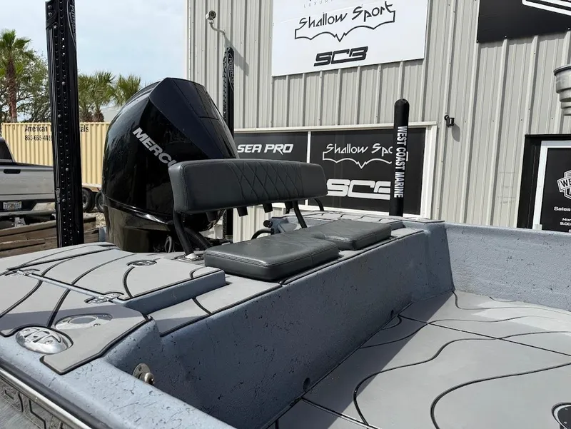 Slide: The Image of 2024 Blazer 2400 boat with Mercury engine, featuring sleek design and comfortable seating. - 4