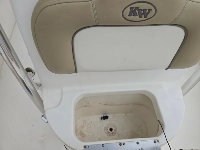Slide: The Image of Key West 210 Bay Reef 2014 boat seat and storage compartment. - 13