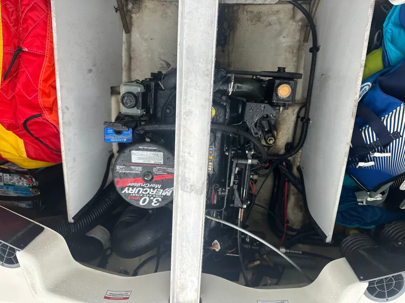 Slide: The Image of Engine compartment of a 2008 Sea Ray 185 Sport with Mercury 3.0 engine. - 5