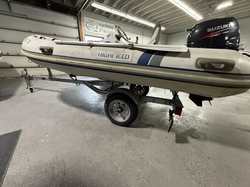 Slide: The Image of 2016 Highfield Classic 360 FCT inflatable boat on trailer in garage. - 8