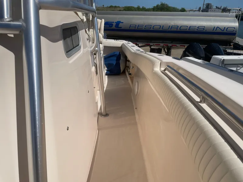 Slide: The Image of 2008 Grady-White Canyon 336 boat deck with railing and side view. - 22