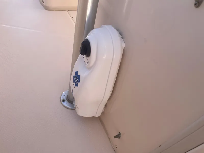 Slide: The Image of 2008 Grady-White Canyon 336 boat detail, featuring a mounted white device on the deck. - 24