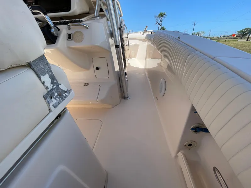 Slide: The Image of 2008 Grady-White Canyon 336 boat interior, featuring seating and control area. - 38
