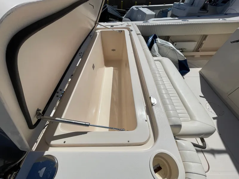 Slide: The Image of Open storage compartment on 2008 Grady-White Canyon 336 boat. - 39