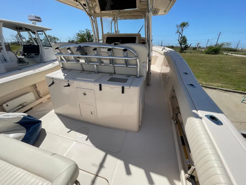 Slide: The Image of 2008 Grady-White Canyon 336 boat interior with seating and storage. - 40
