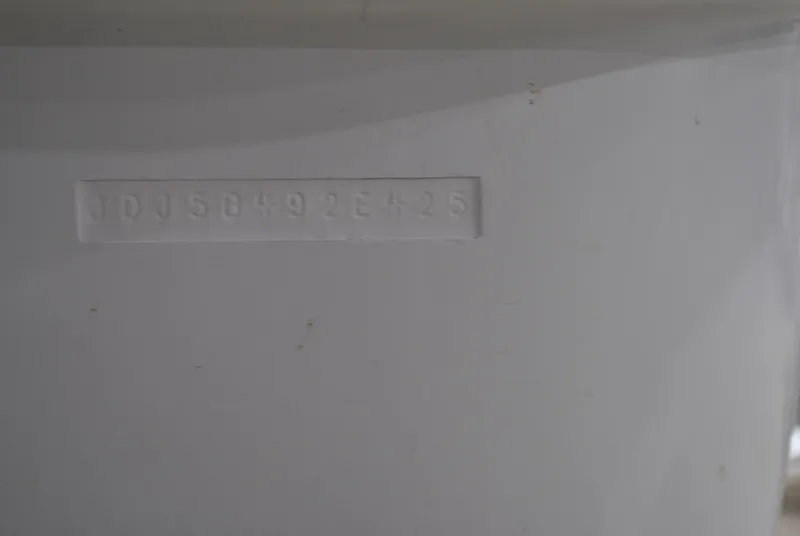 Slide: The Image of Hull identification number on 2025 Contender 25 Bay boat. - 10