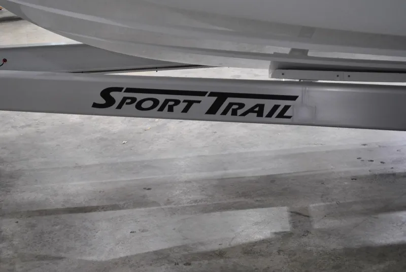 Slide: The Image of Trailer for 2025 Contender 25 Bay boat with "Sport Trail" branding. - 26