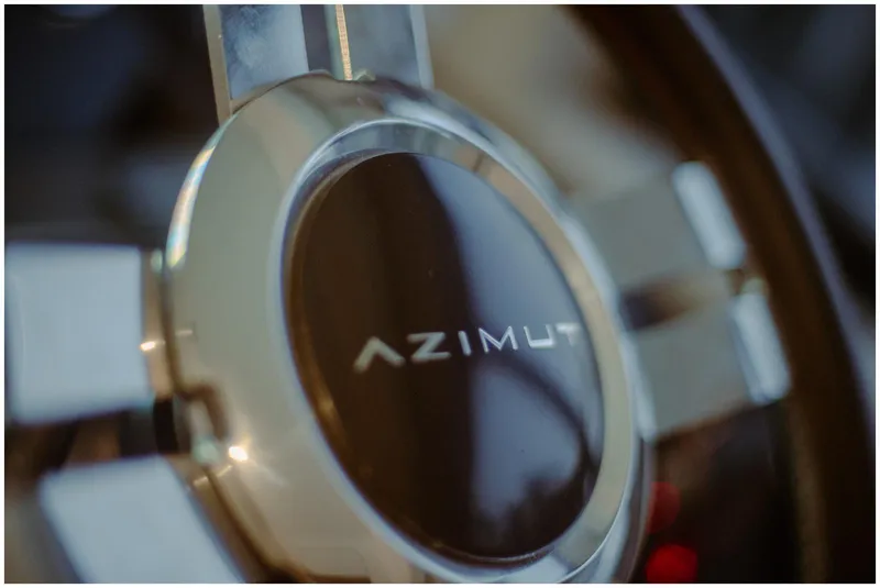 Slide: The Image of Close-up of Azimut 2022 Fly steering wheel emblem. - 23